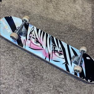 RAZOR X 31 Inch Skateboard (Anime Eyes)